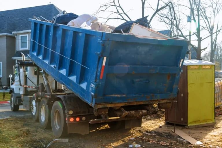 Junk Removal Truck Dumping Junk