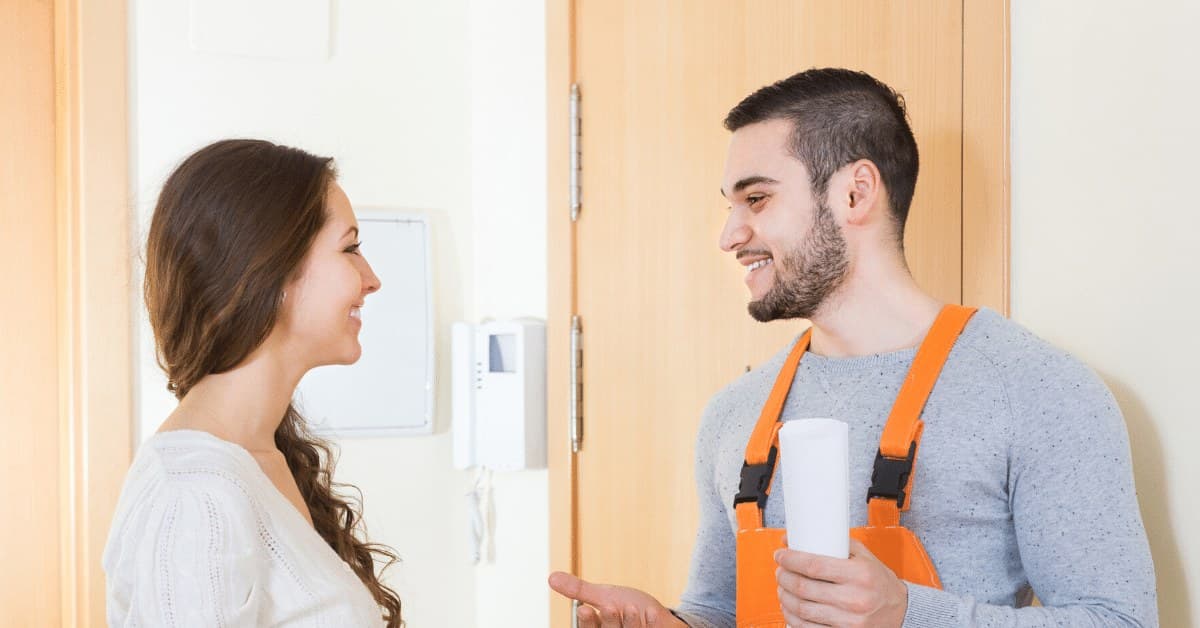 Plumber With A Customer