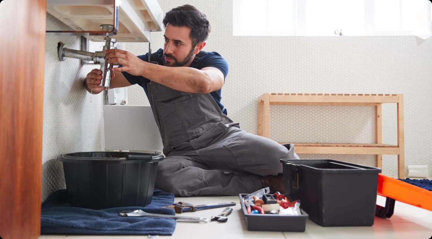 Plumbing Technician Working
