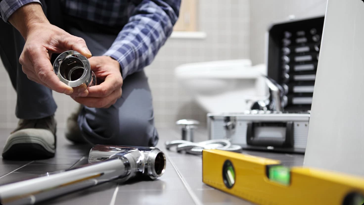 Hands Plumber At Work
