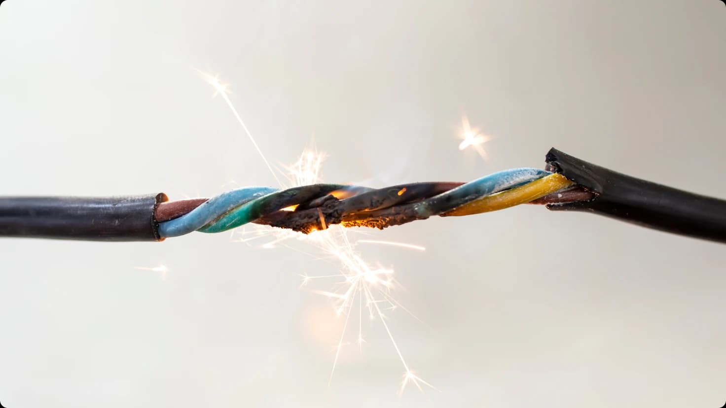 Flame Smoke And Sparks On An Electrical Cable
