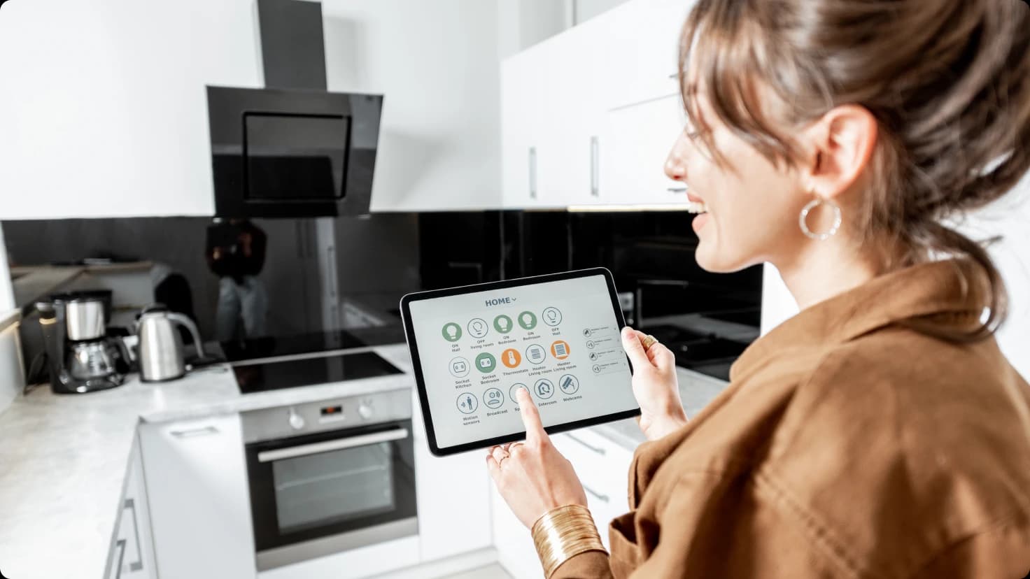 Woman With Smart Kitchen Appliance