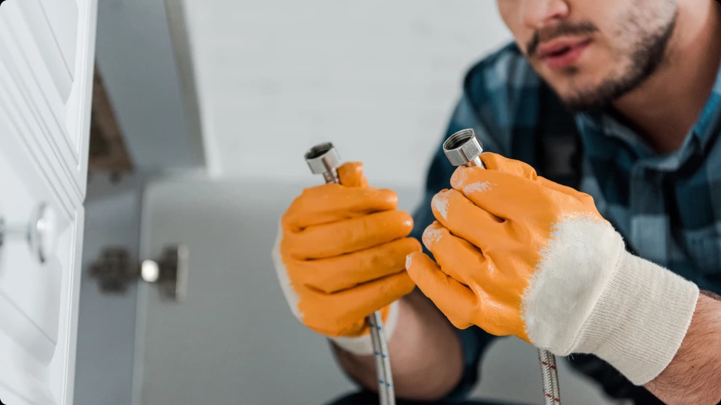 Plumber At Work
