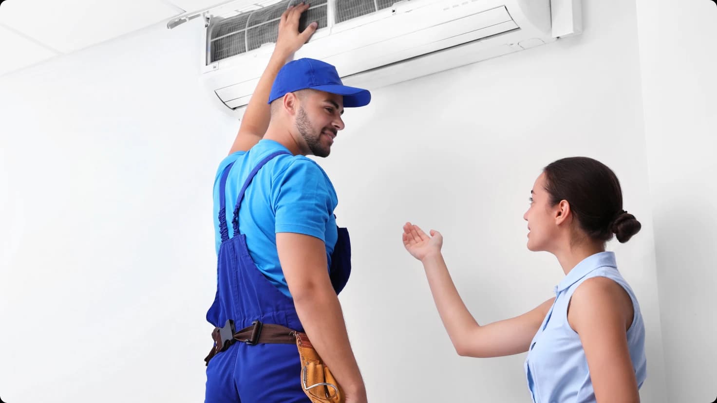 Hvac Technician With Client