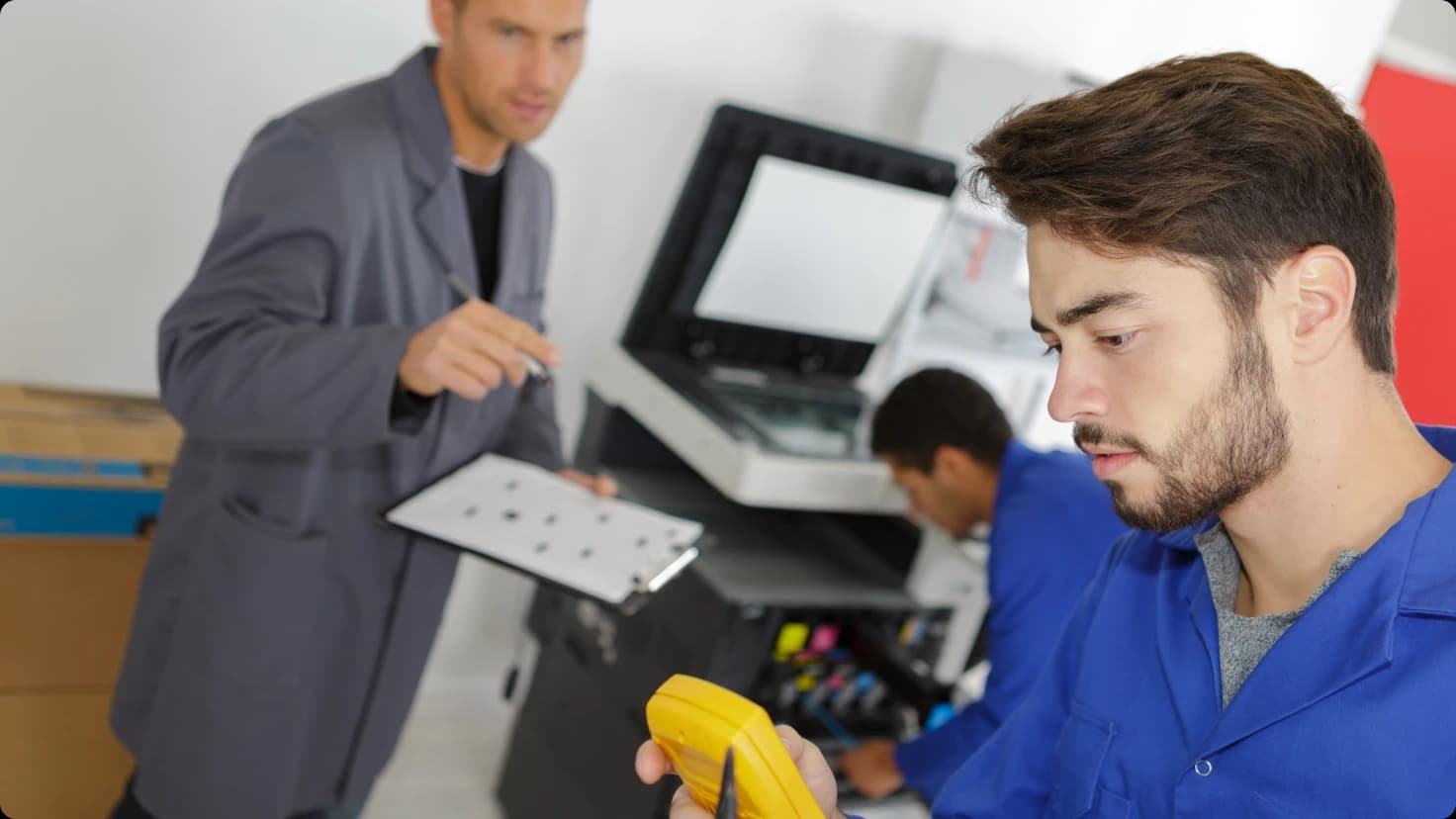 Young Electrician With Multimeter During Class