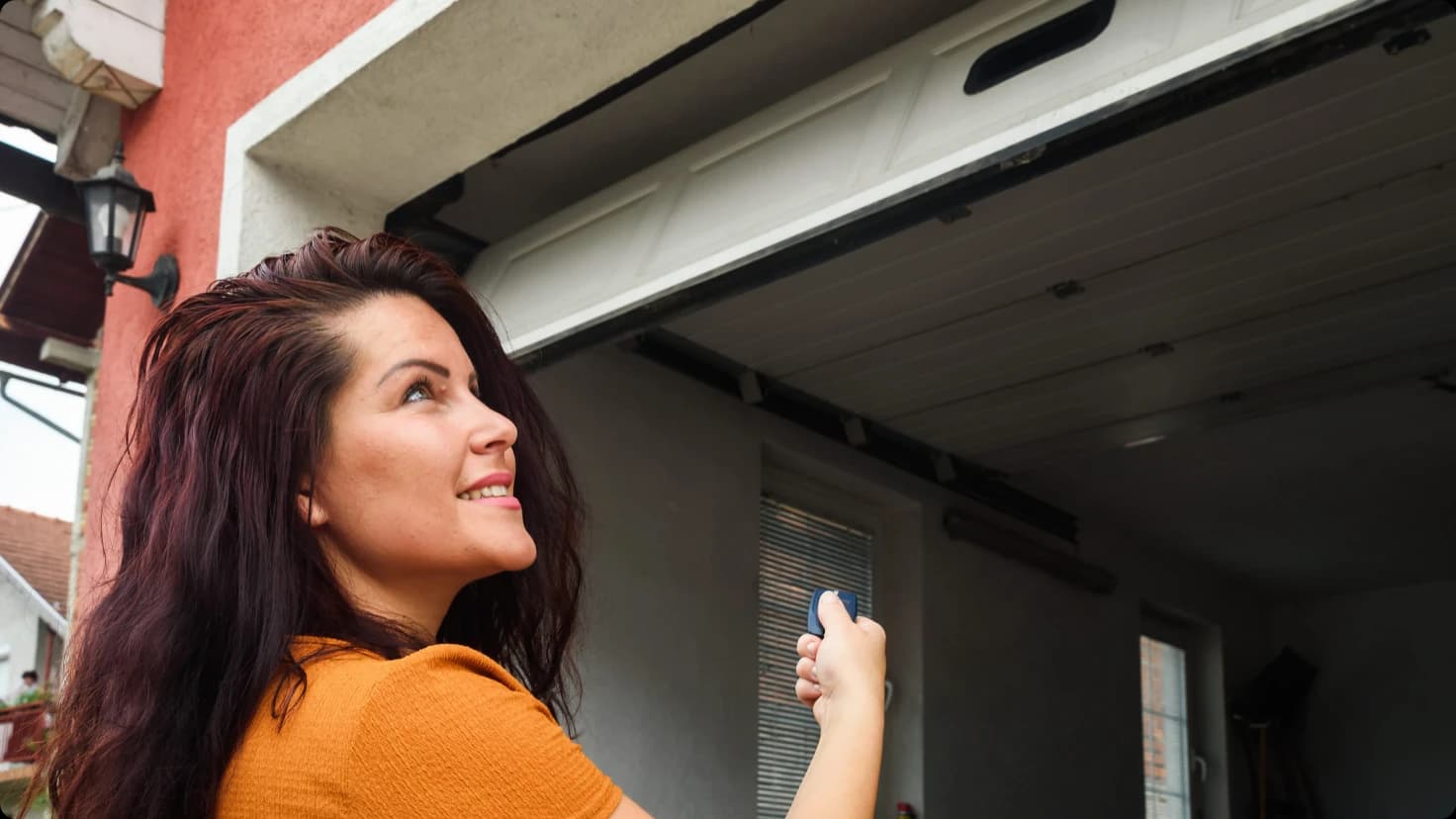 Woman Opening Garage Door