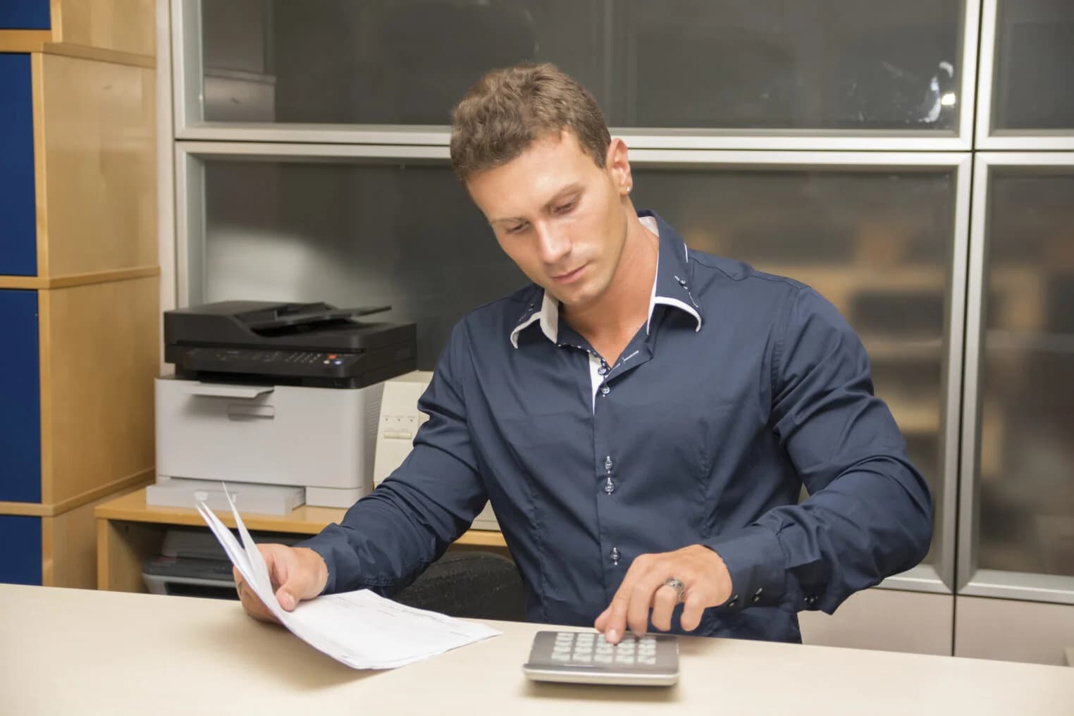 Bussines Owner Doing Accounting