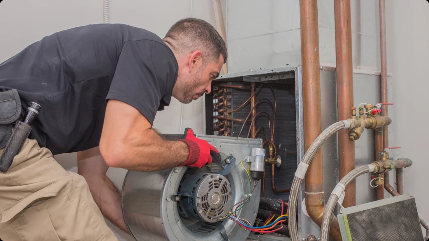 Hvac Technician Installing A C Unit